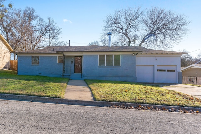 single story home with a front lawn and a garage