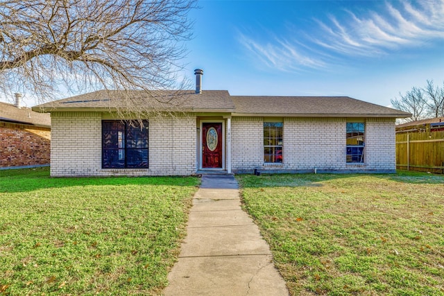 single story home featuring a front yard