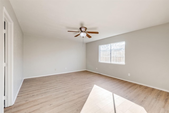 unfurnished room with ceiling fan and light hardwood / wood-style floors