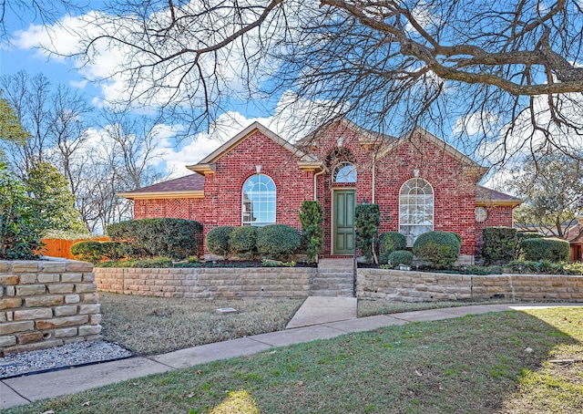 view of front property with a front lawn