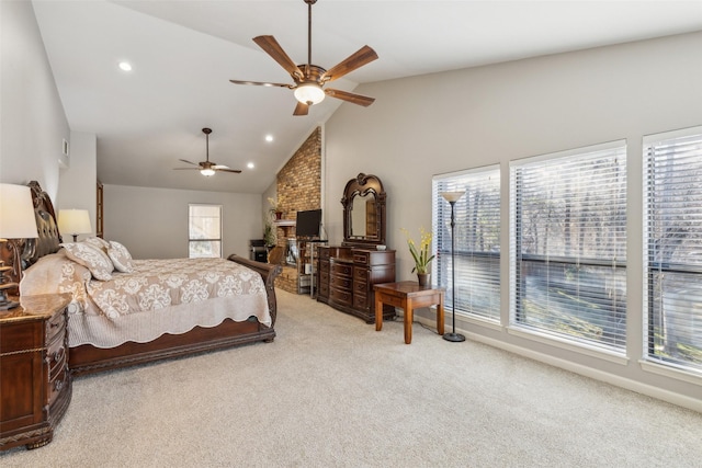 carpeted bedroom with ceiling fan and lofted ceiling