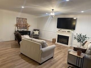 living room with light hardwood / wood-style flooring