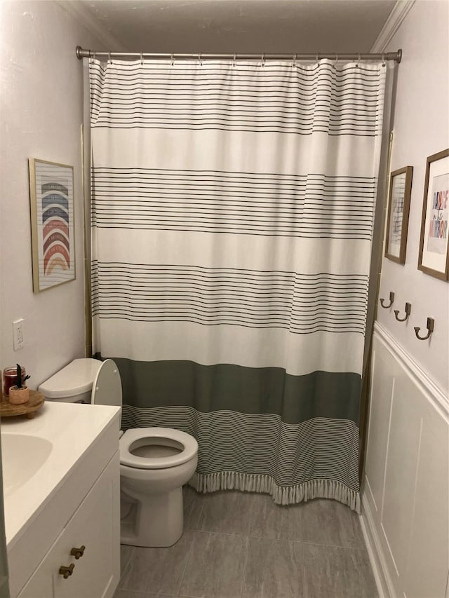 bathroom featuring vanity, ornamental molding, tile patterned floors, and a shower with shower curtain