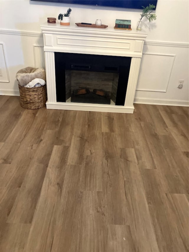 details featuring wood-type flooring