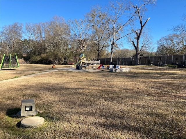 view of yard with a playground