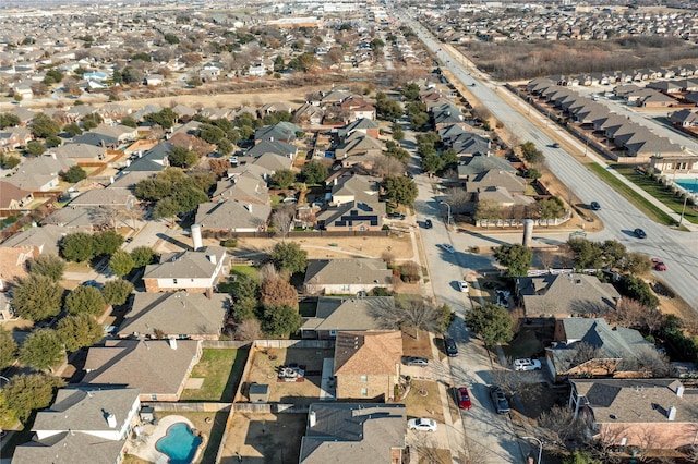 birds eye view of property with a residential view