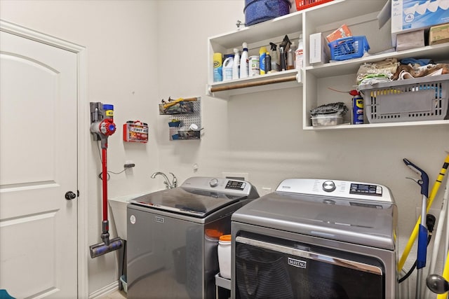 washroom with separate washer and dryer