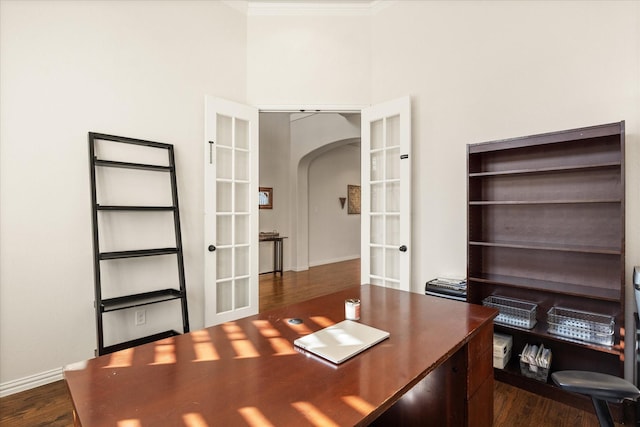 unfurnished office featuring dark wood-type flooring and french doors