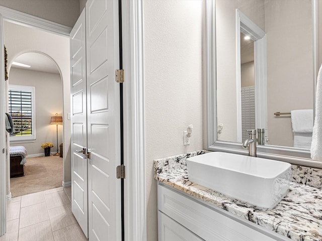 bathroom featuring tile patterned floors and vanity