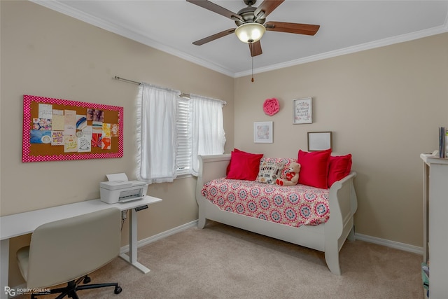 carpeted bedroom with ceiling fan and crown molding