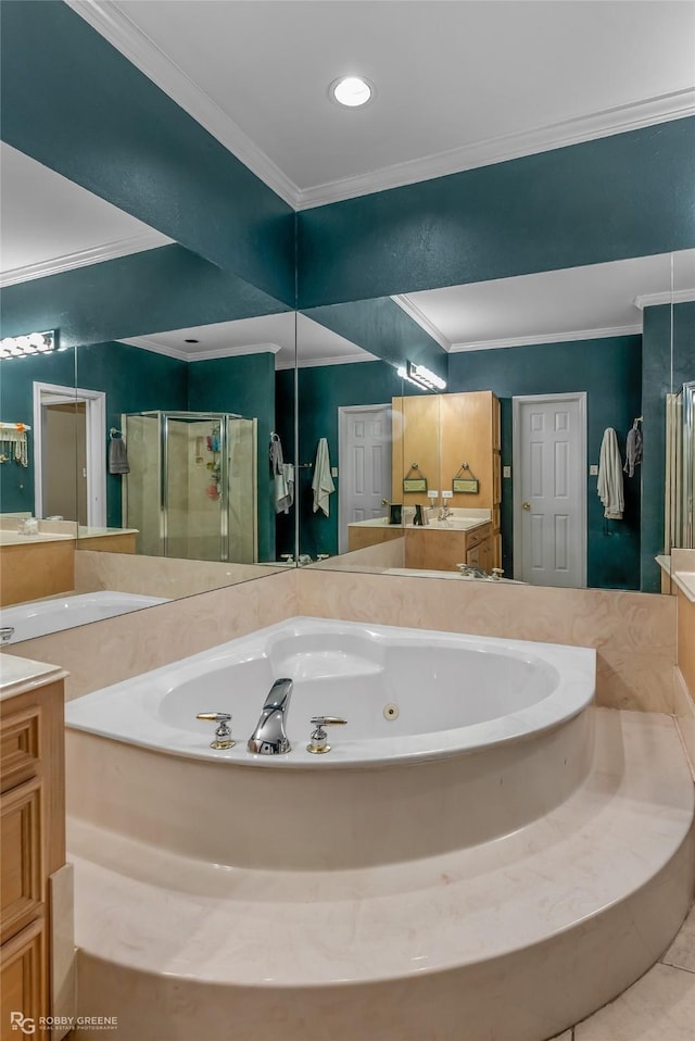 bathroom with vanity, ornamental molding, and shower with separate bathtub