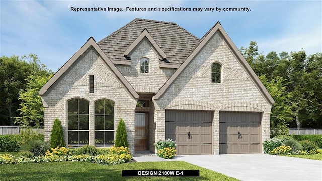 french provincial home with a garage