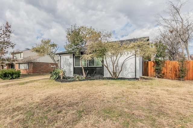 exterior space with a yard