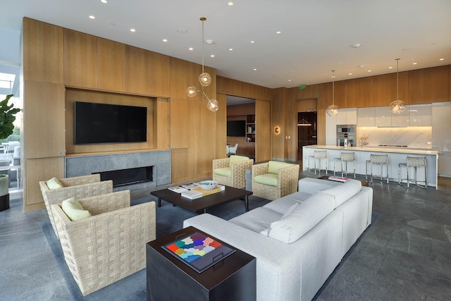 living room featuring wooden walls