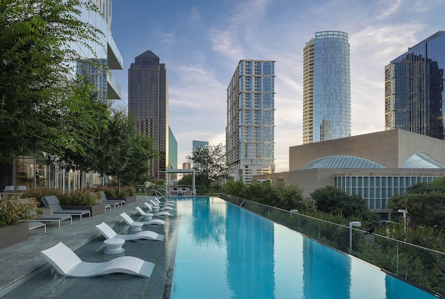 view of pool featuring a patio area