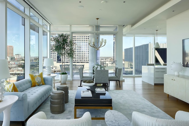 sunroom featuring a notable chandelier