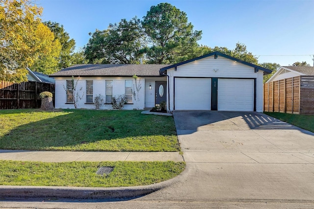 ranch-style house with a front yard and a garage