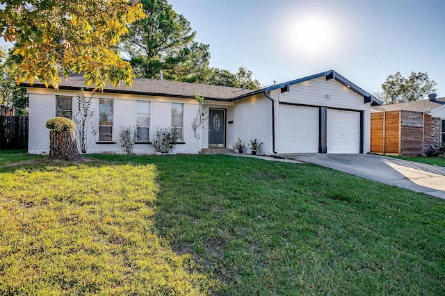 single story home with a garage and a front yard