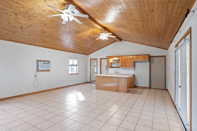 kitchen with light tile patterned floors, wooden ceiling, ceiling fan, an AC wall unit, and lofted ceiling with beams