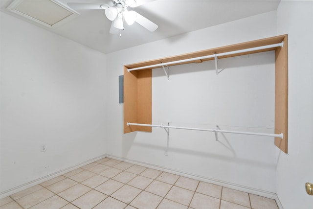 spacious closet featuring ceiling fan and electric panel