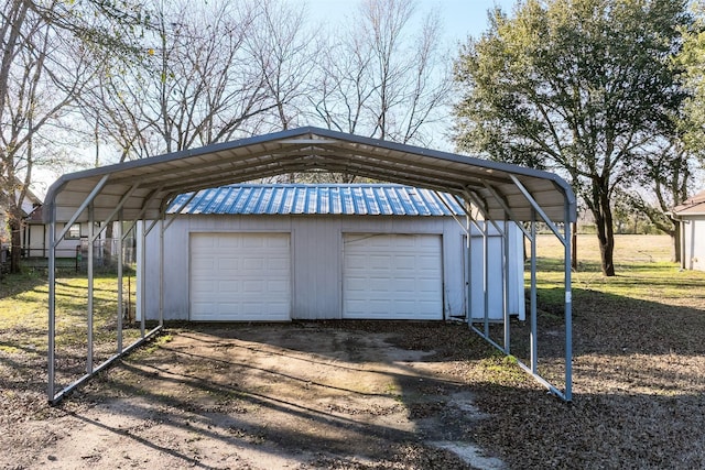 garage featuring a carport