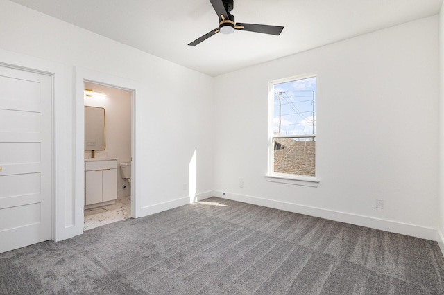 unfurnished bedroom featuring ceiling fan, connected bathroom, and carpet floors