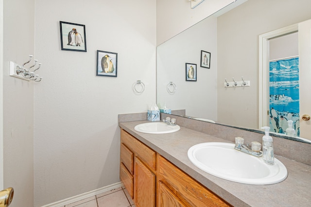 bathroom with vanity and tile patterned floors