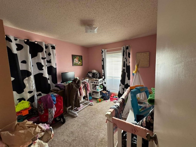 carpeted bedroom with a textured ceiling