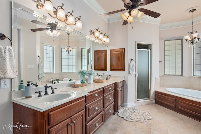 9356 Dogwood Trl, Haughton, LA 71037 - full bath with ceiling fan with notable chandelier, a sink, a shower stall, and ornamental molding