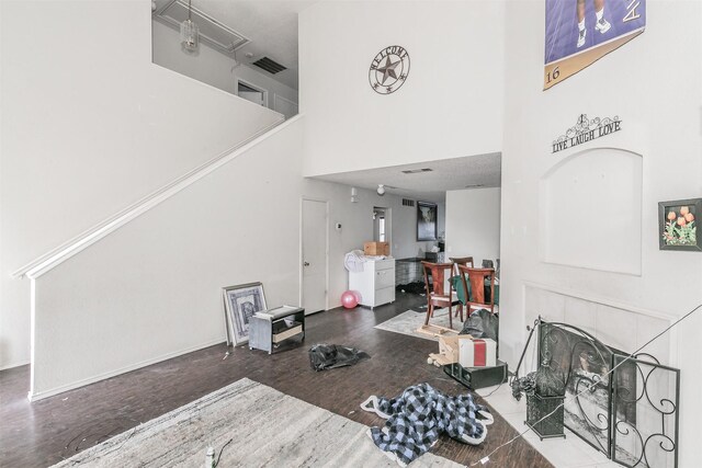 living room with a high ceiling