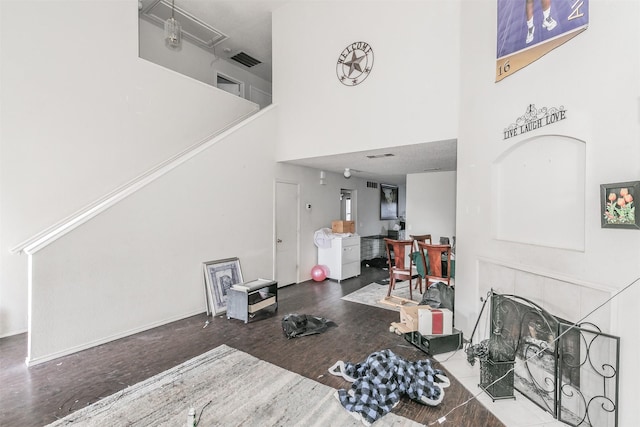 living room with a high ceiling