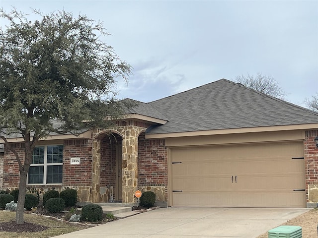 single story home featuring a garage