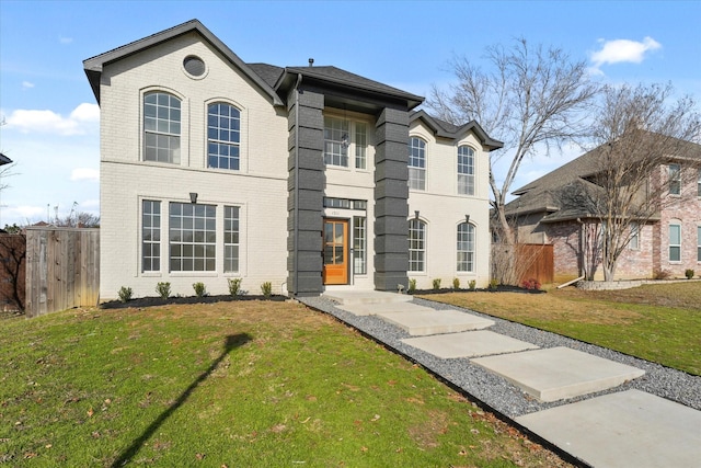 view of front of home featuring a front lawn