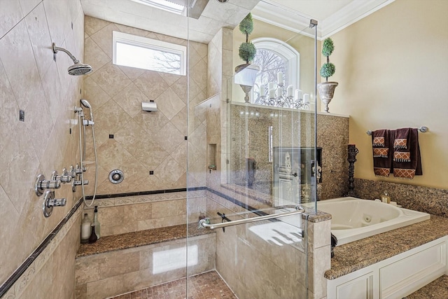 full bathroom with a tub with jets, ornamental molding, and a shower stall