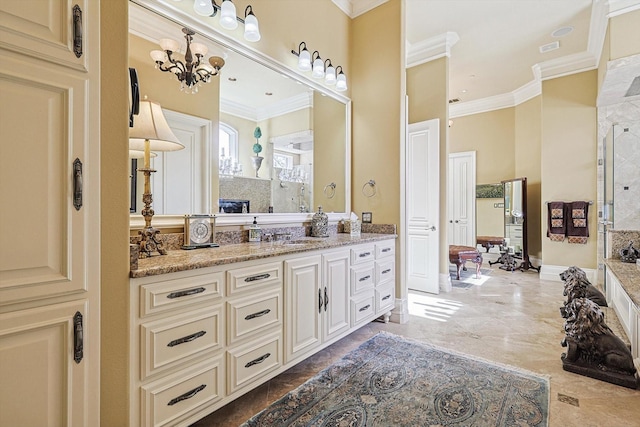 bathroom featuring crown molding, a chandelier, tiled shower, and vanity