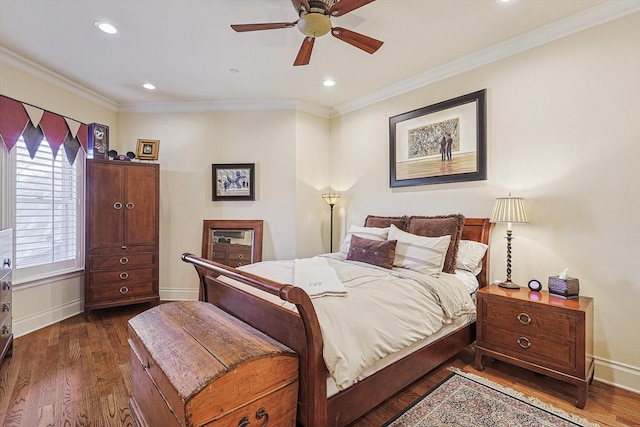 bedroom featuring dark wood-style floors, ornamental molding, recessed lighting, and baseboards