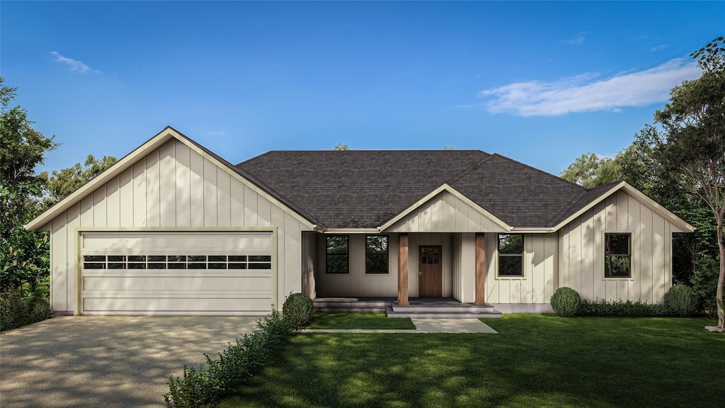 modern inspired farmhouse with a front yard and a garage