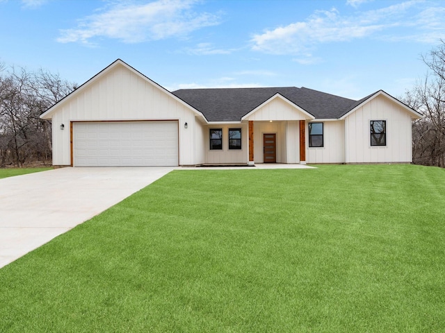 modern farmhouse with a garage, concrete driveway, roof with shingles, a front lawn, and board and batten siding