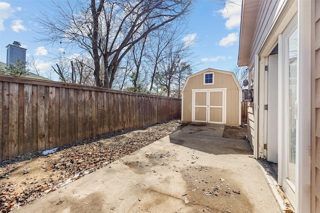 view of patio featuring a storage unit