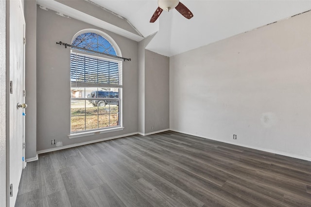 unfurnished room with lofted ceiling, ceiling fan, and dark hardwood / wood-style flooring