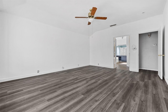 unfurnished living room with ceiling fan and dark wood-type flooring