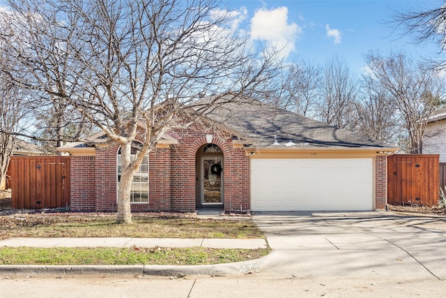 view of front of property featuring a garage