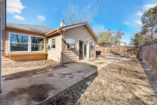 rear view of house with a patio