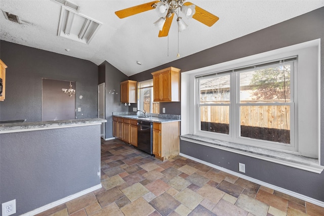 kitchen featuring ceiling fan with notable chandelier, a textured ceiling, dishwasher, sink, and vaulted ceiling