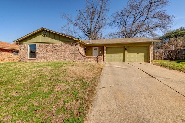 ranch-style home with an attached garage, brick siding, concrete driveway, a front lawn, and board and batten siding