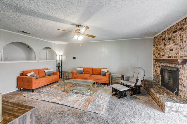 bedroom with ceiling fan, a textured ceiling, and dark colored carpet