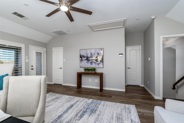 home office featuring ceiling fan, vaulted ceiling, and dark hardwood / wood-style floors