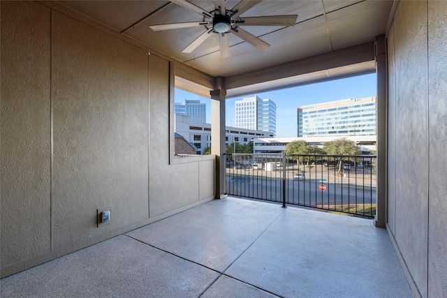 balcony featuring ceiling fan