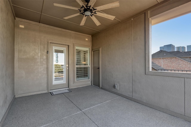 view of patio featuring ceiling fan