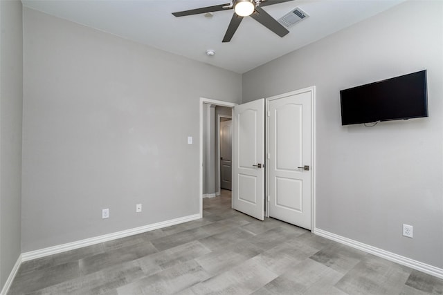 unfurnished bedroom with ceiling fan